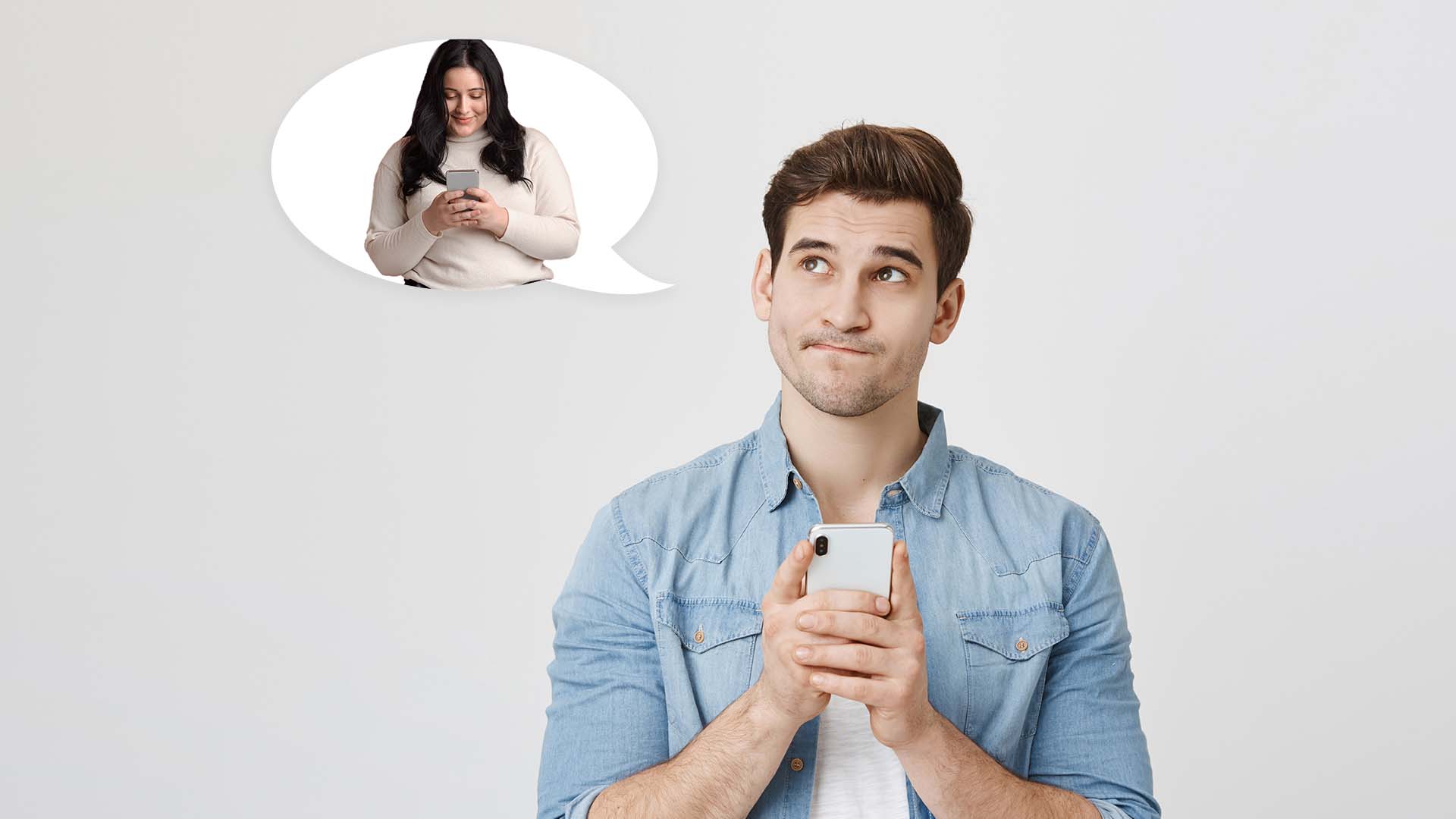 Brunette man in jean shirt holding his phone while thinking about brunette BBW woman smiling while holding her phone.