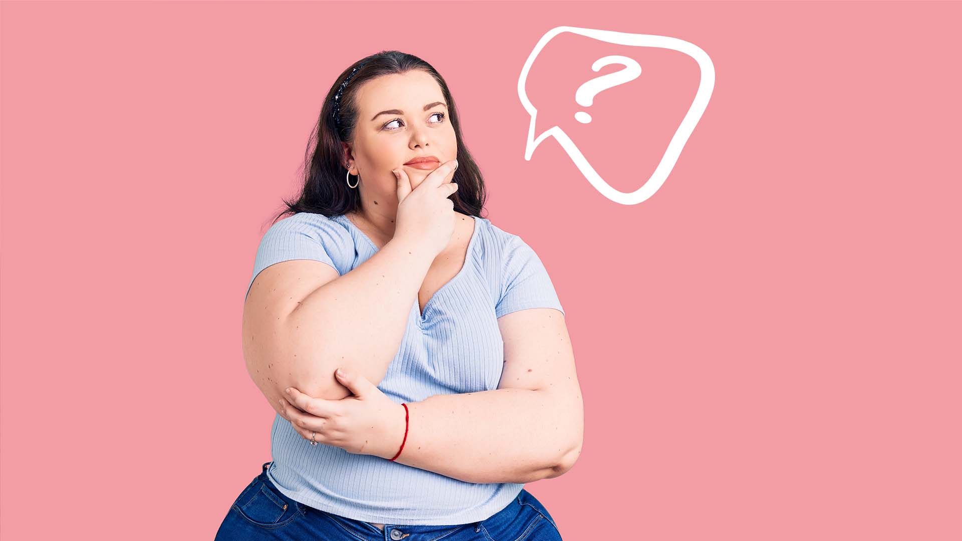 Brunette BBW in light blue shirt and jeans, holding her chin with one hand and looking at a question mark next to her.