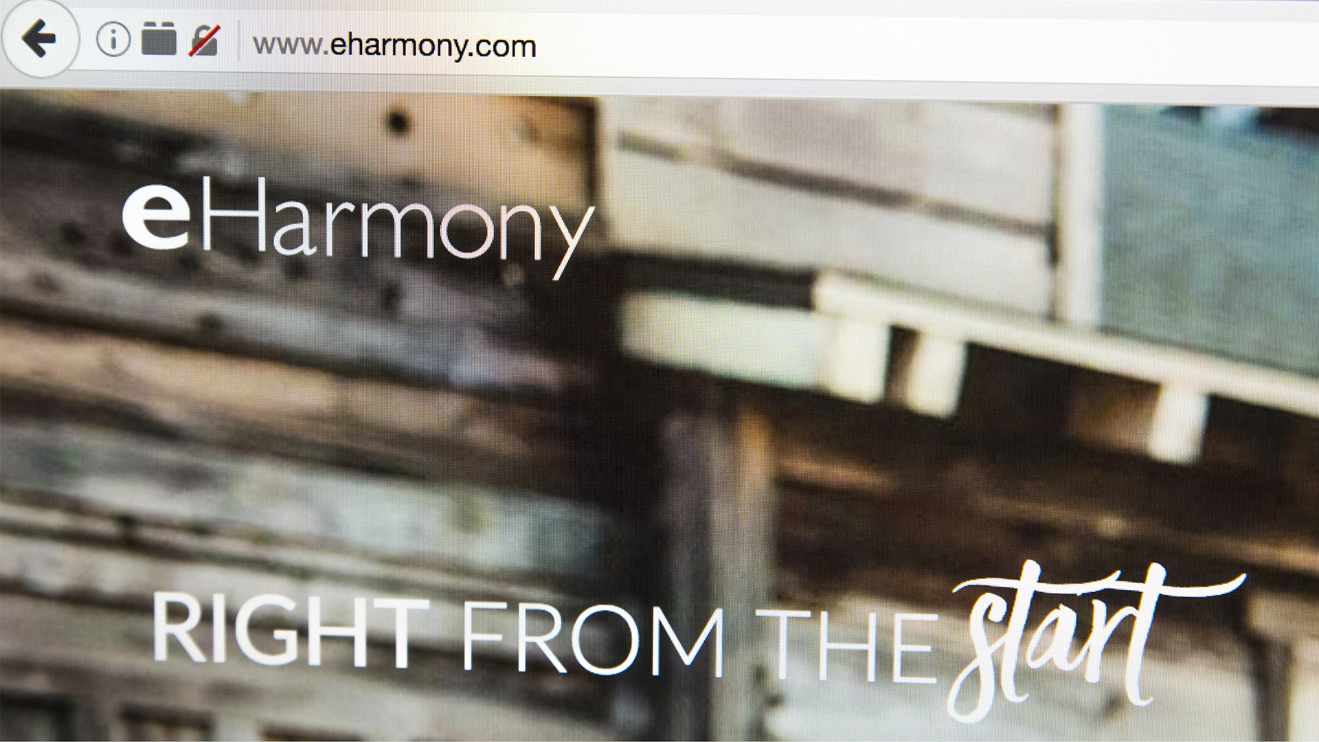 Screenshot of a browser loaded in the eHarmony homepage.